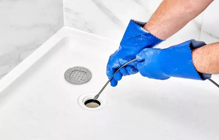 clearing a shower drain