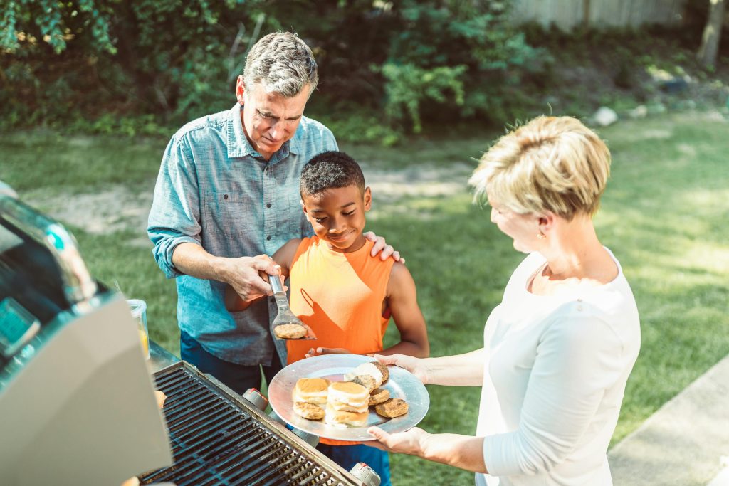 famliy grilling outside