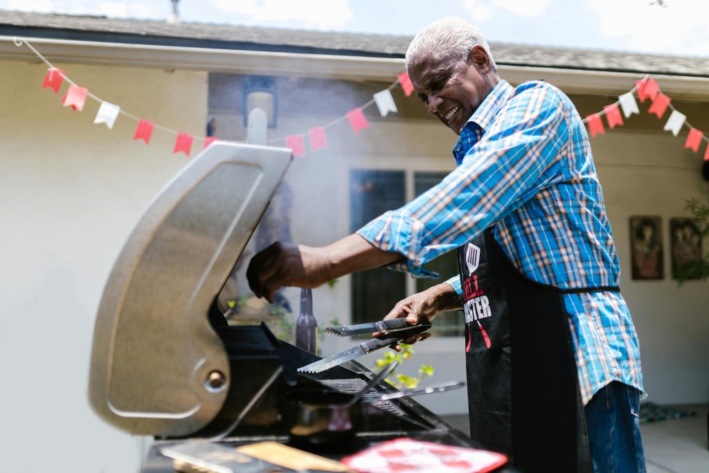 man grilling outside